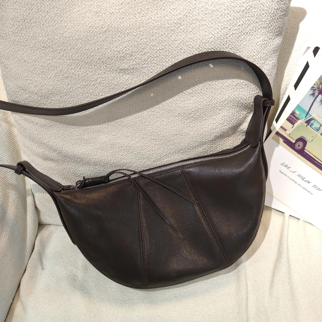 HY2025秋冬新款韩系牛角包车缝线拼接单肩斜挎饺子包复古风女士包