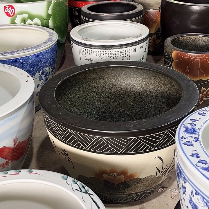 鑫***胜景德镇陶瓷鱼缸艺术