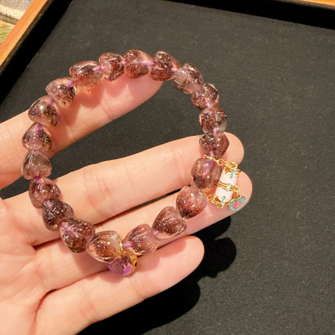 E07未镶嵌超七草莓晶手串25216