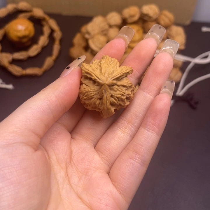 X***来吊坠桃核三棱单只异型有瑕