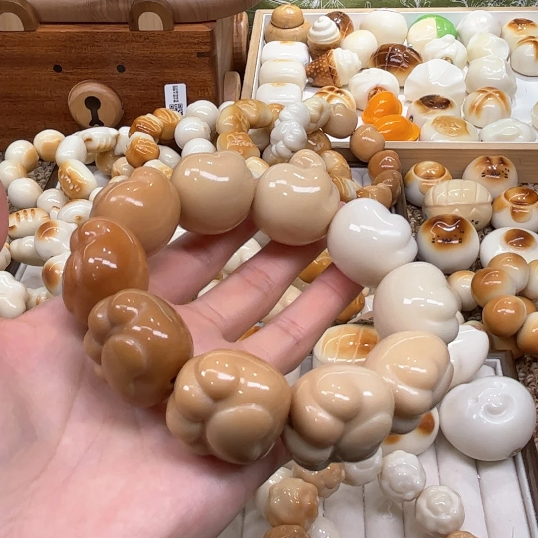 菩提根/象牙果手串9.27.54象牙果渐变熊掌微瑕