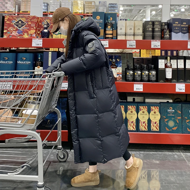 优等鹅绒服女长款韩版休闲时尚黑金加厚宽松情侣保暖连帽羽绒服潮