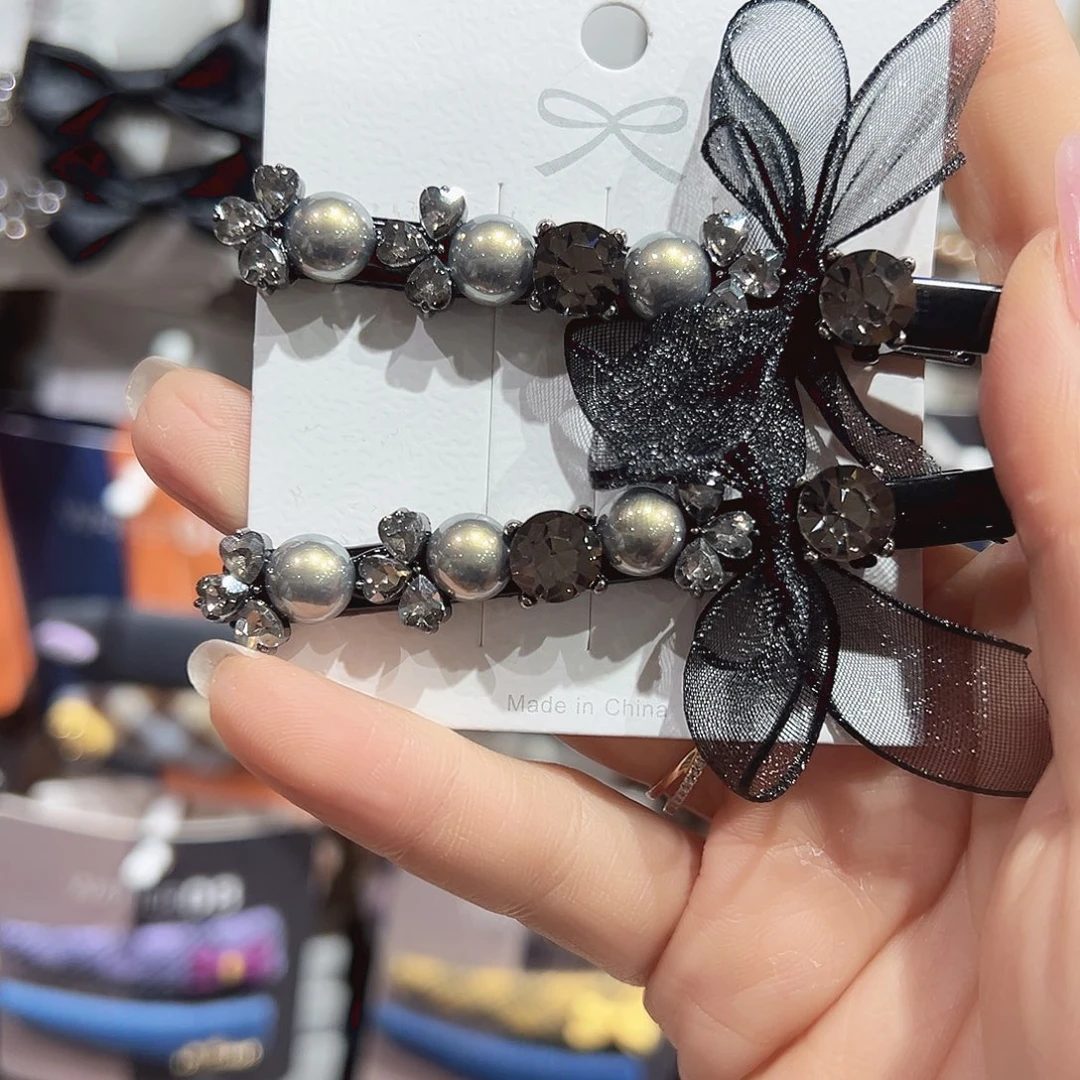 非金属黑色蝴蝶结银色珠珠鸭夹