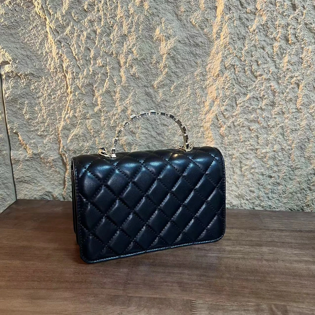 24年秋冬新款真皮重工女包手提钻黑色