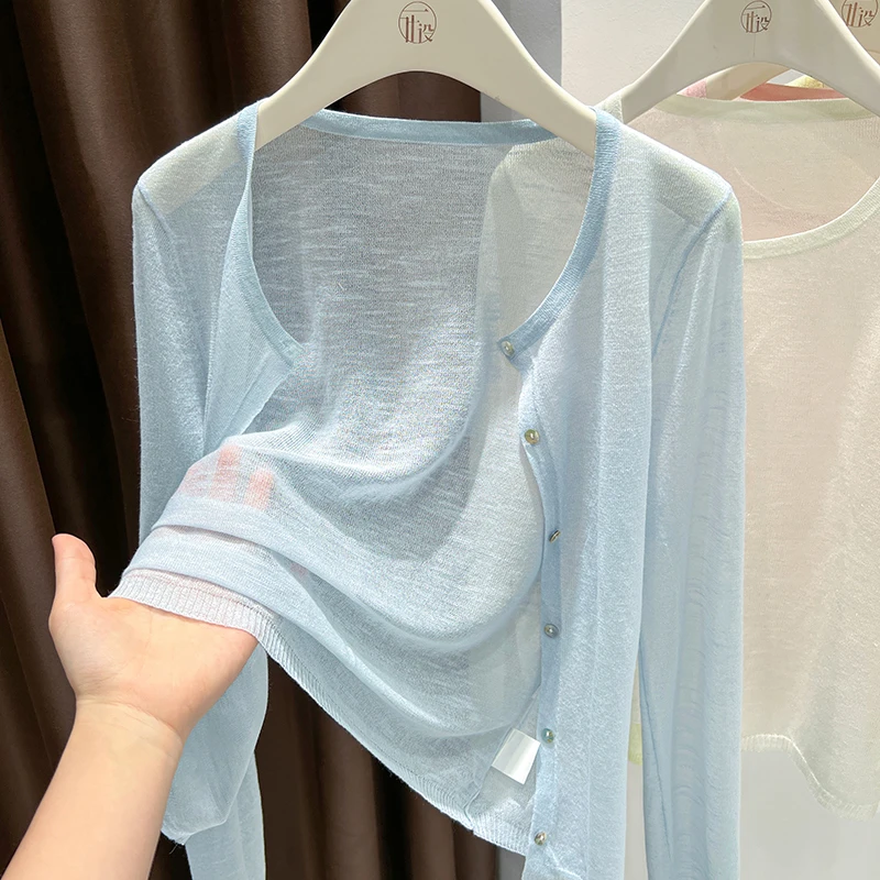 蓝色圆领长袖镂空针织开衫2025新款配吊带裙外搭宽松减龄外套