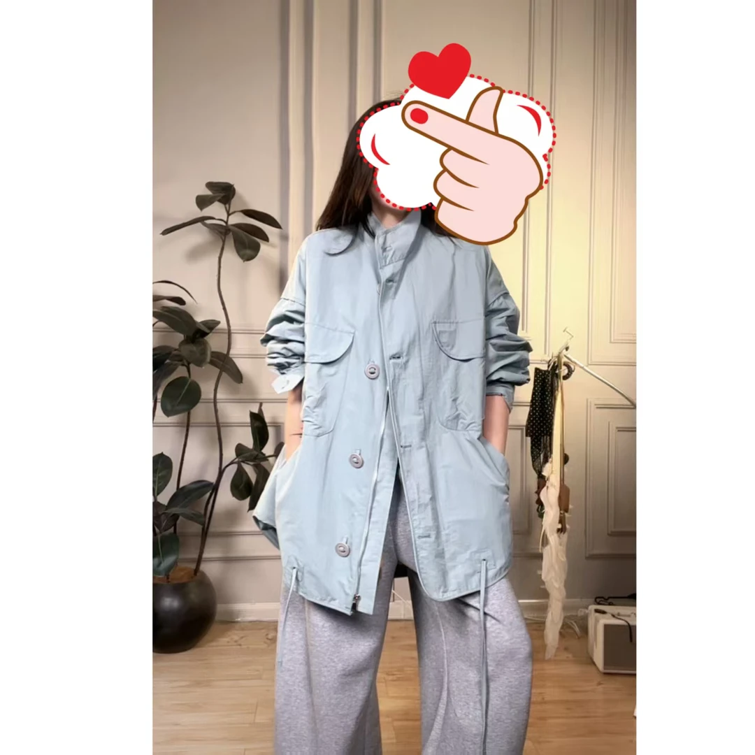 调性蓝色风衣咩咩