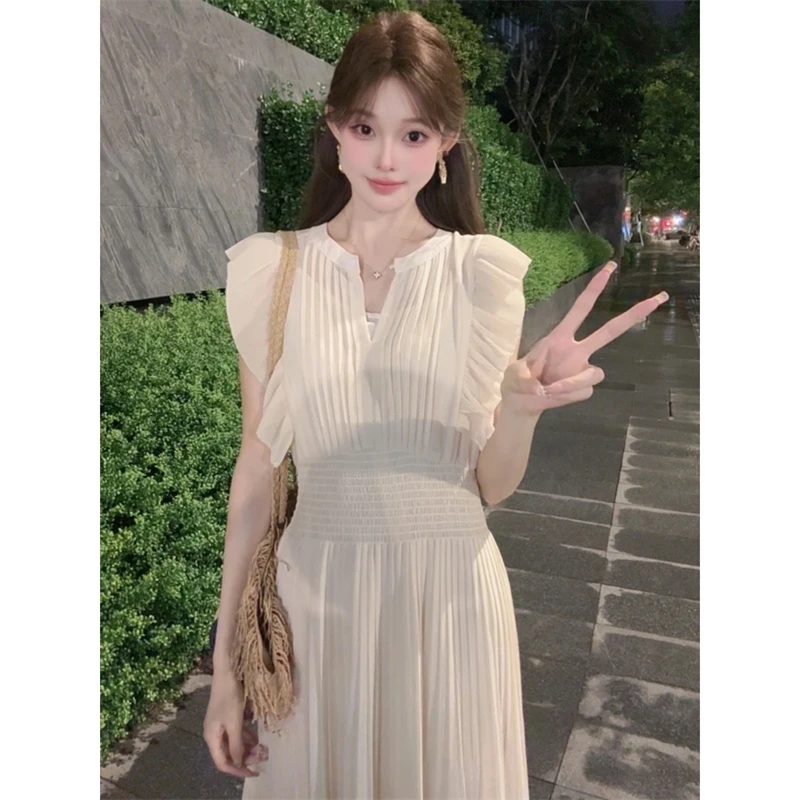 法式甜美风荷叶边粉色小飞袖连衣裙女夏季新款压褶收腰气质长裙子