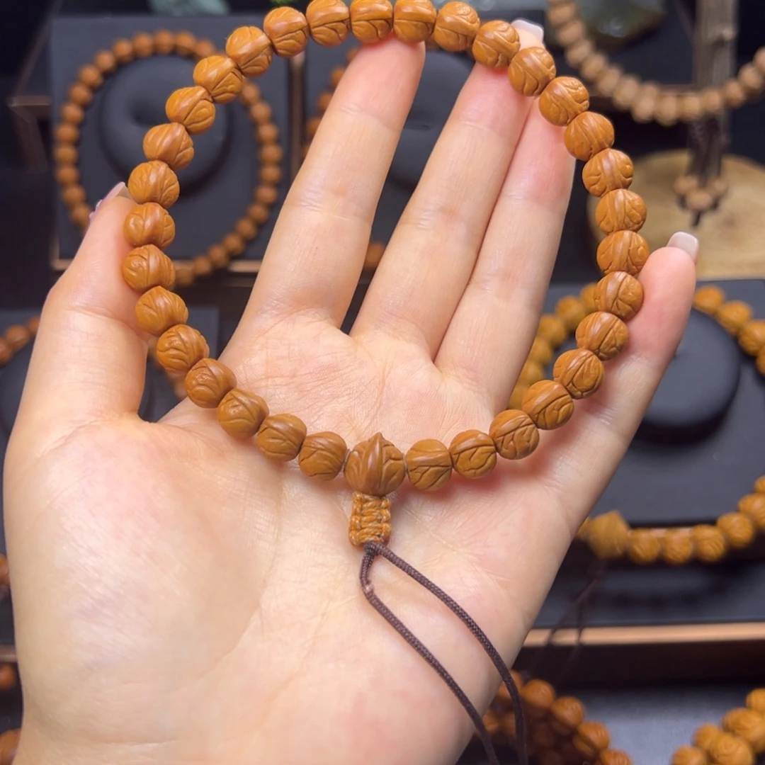 老***鼻手串桃核野生玉龙脊0.9