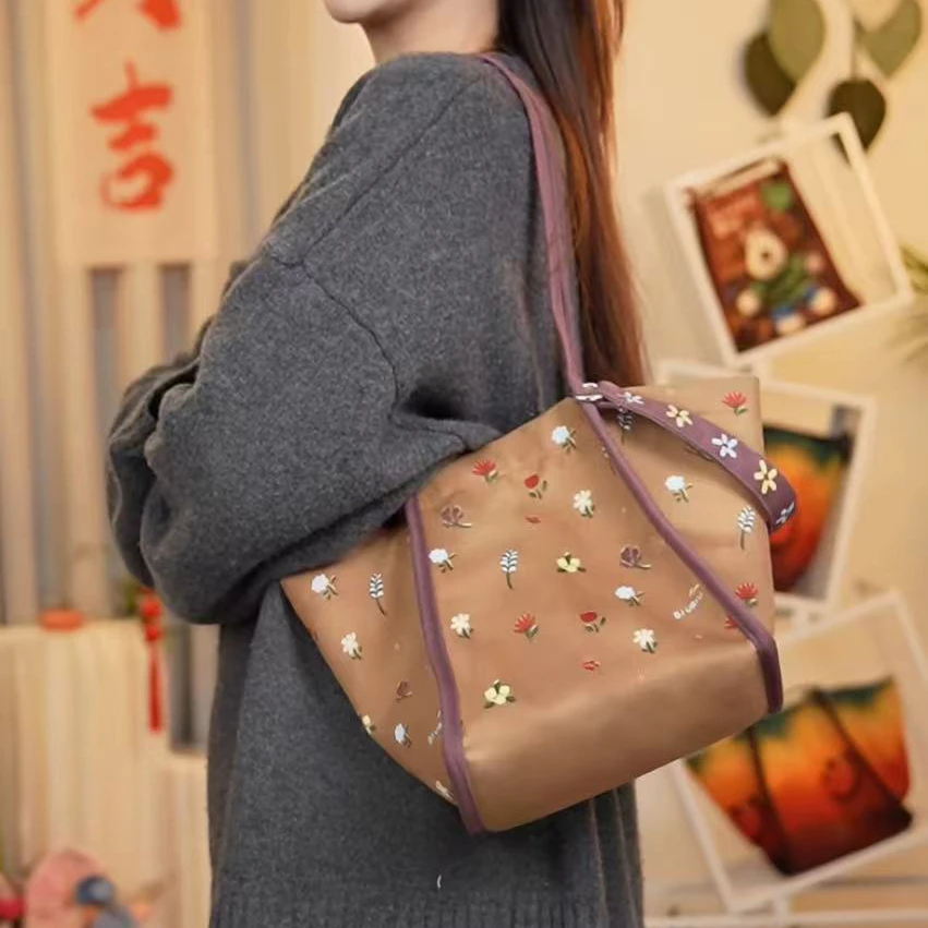 嘉哥 新款迎春细肩带元宝包单肩斜跨休闲通勤大容量帆布包女