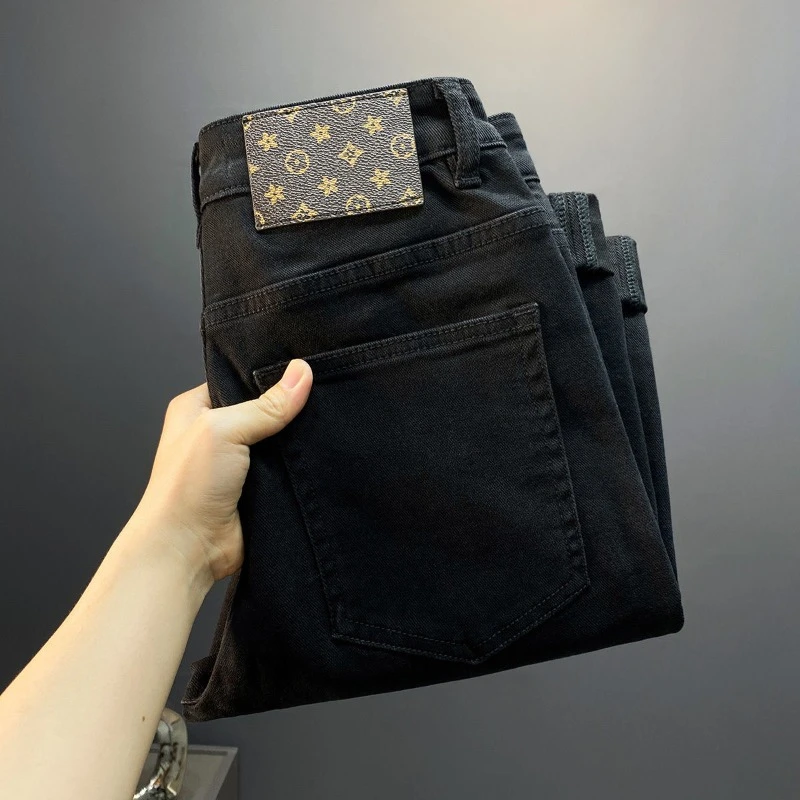 黑色牛仔裤男款2025年春季新款潮牌修身小脚高端直筒休闲男裤