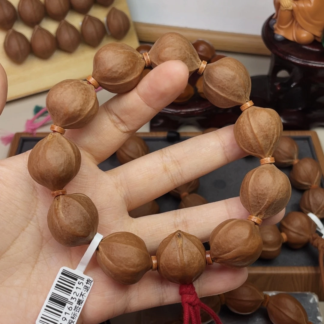 玖***柒橄榄核手串/手链21.524梅林铁核