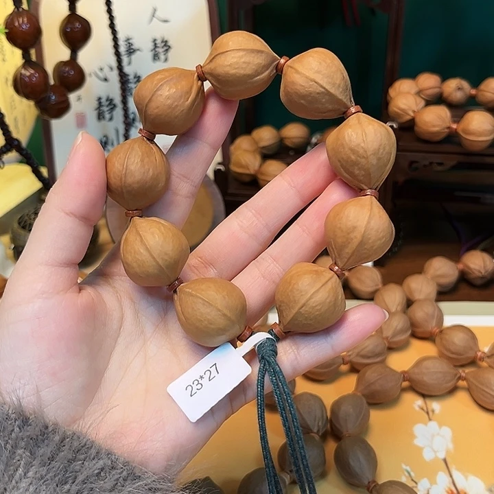 金***a橄榄核吊坠2327梅林铁核