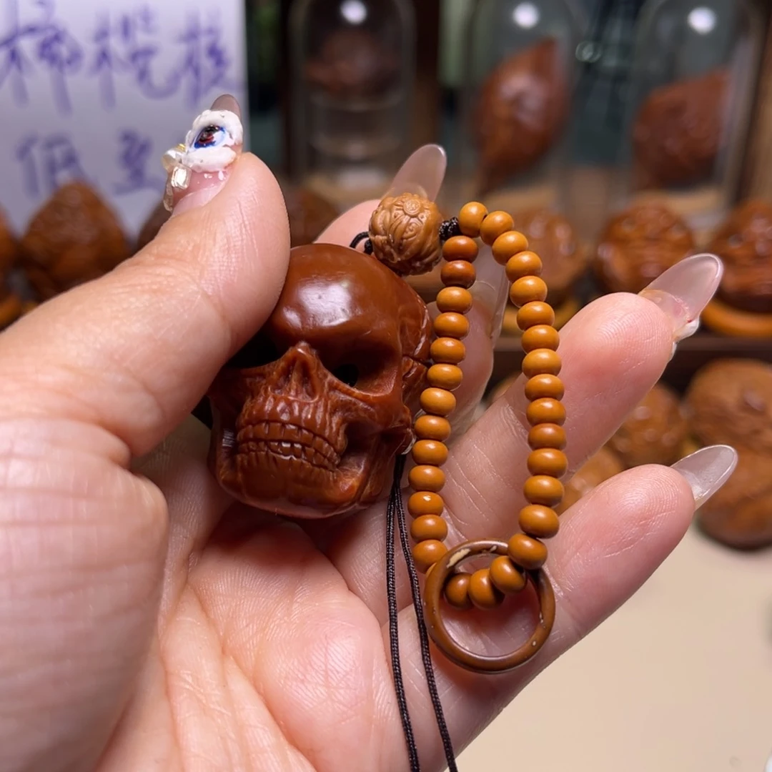 橄榄核把件一****?骷髅女财跑环一套 三点二尺