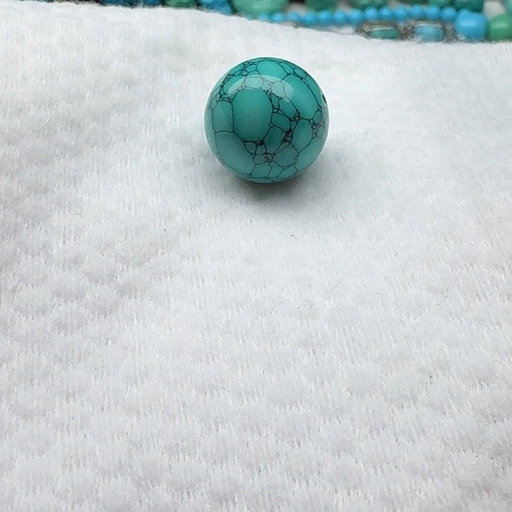 尺寸：18绿水草纹圆珠一颗
