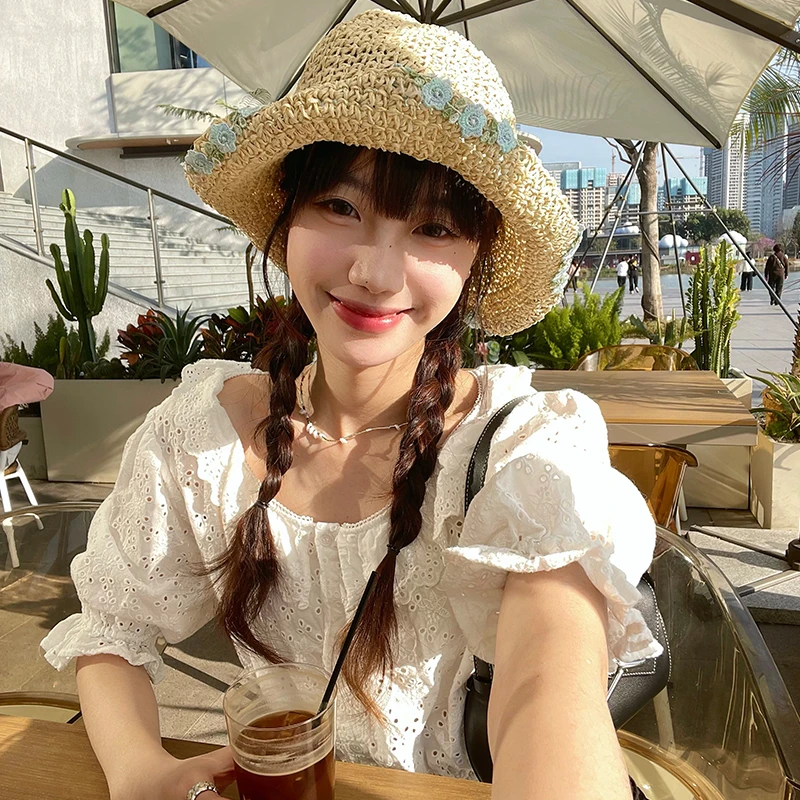 蓝色花朵编织渔夫帽女2025年春新款大帽檐草帽海边防晒太阳帽子潮
