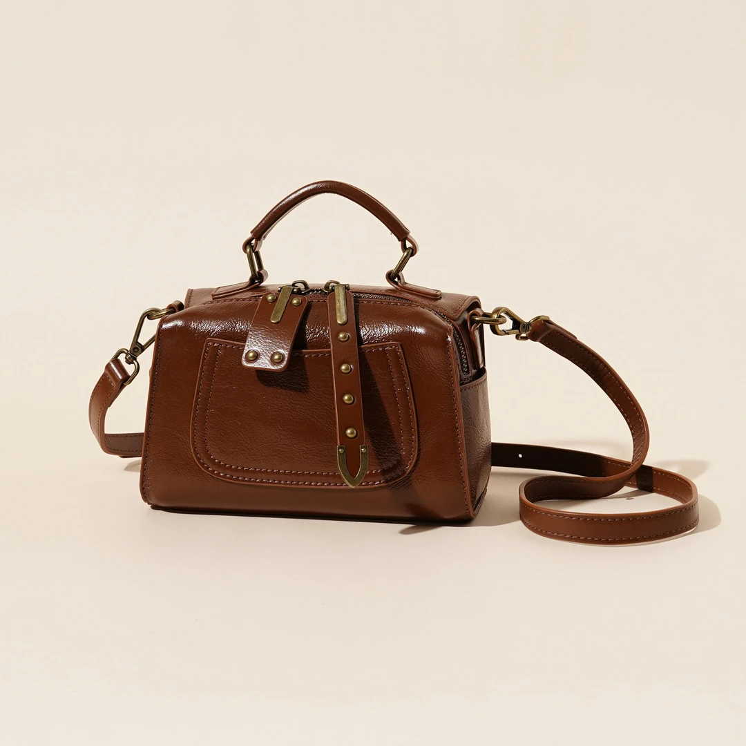 【万达撤柜】高端奢侈品春夏新款真皮波士顿枕头包时尚休闲手提适用