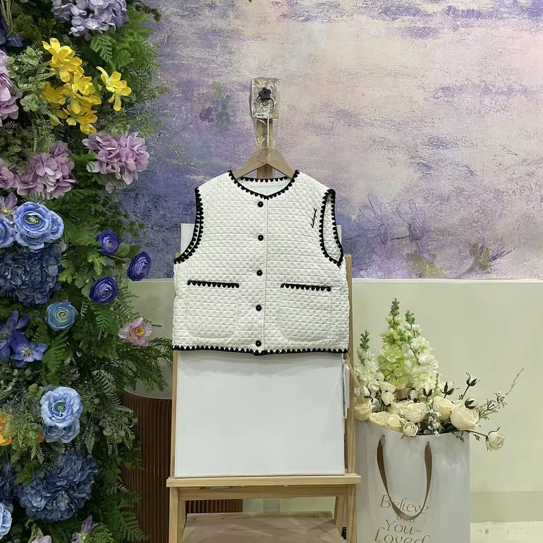 777Z米色羽绒服1606