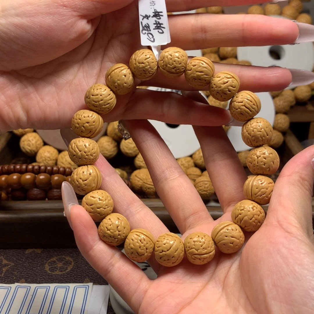 龍*精品桃核金丹手串