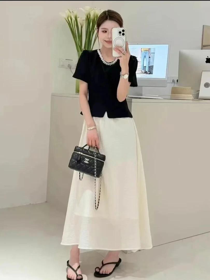 温柔风气质黑色珍珠泡泡袖开叉上衣女2025夏季设计感法式短袖套裙