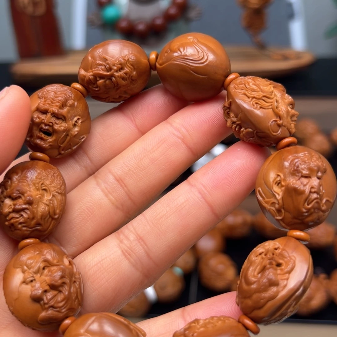 橄榄核吊坠罗汉手串