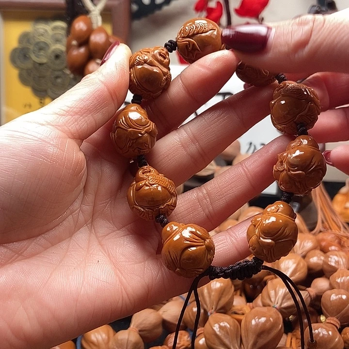 李***麦橄榄核手串/手链米勒佛