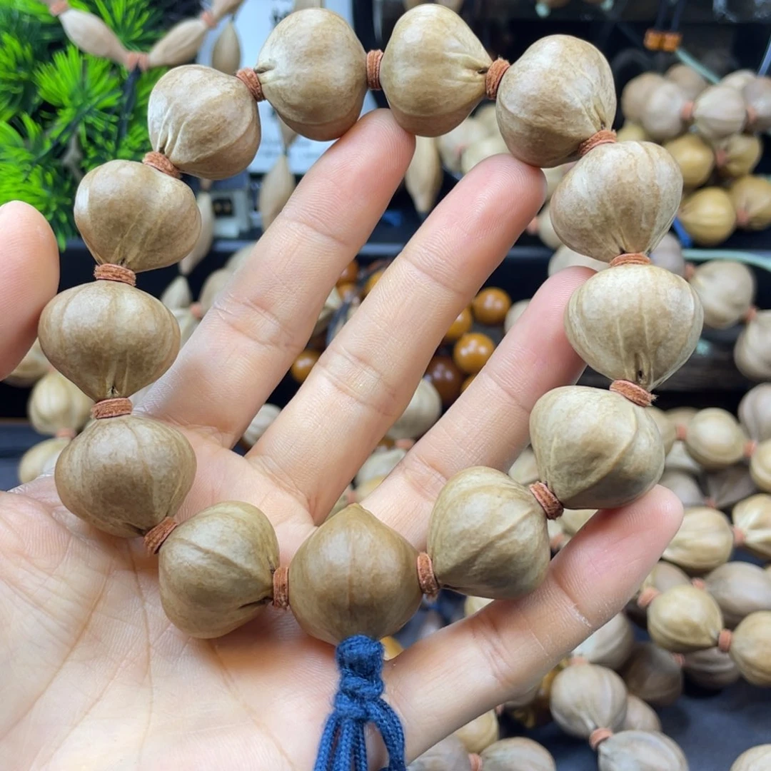 ****主橄榄核吊坠006.23x23老料