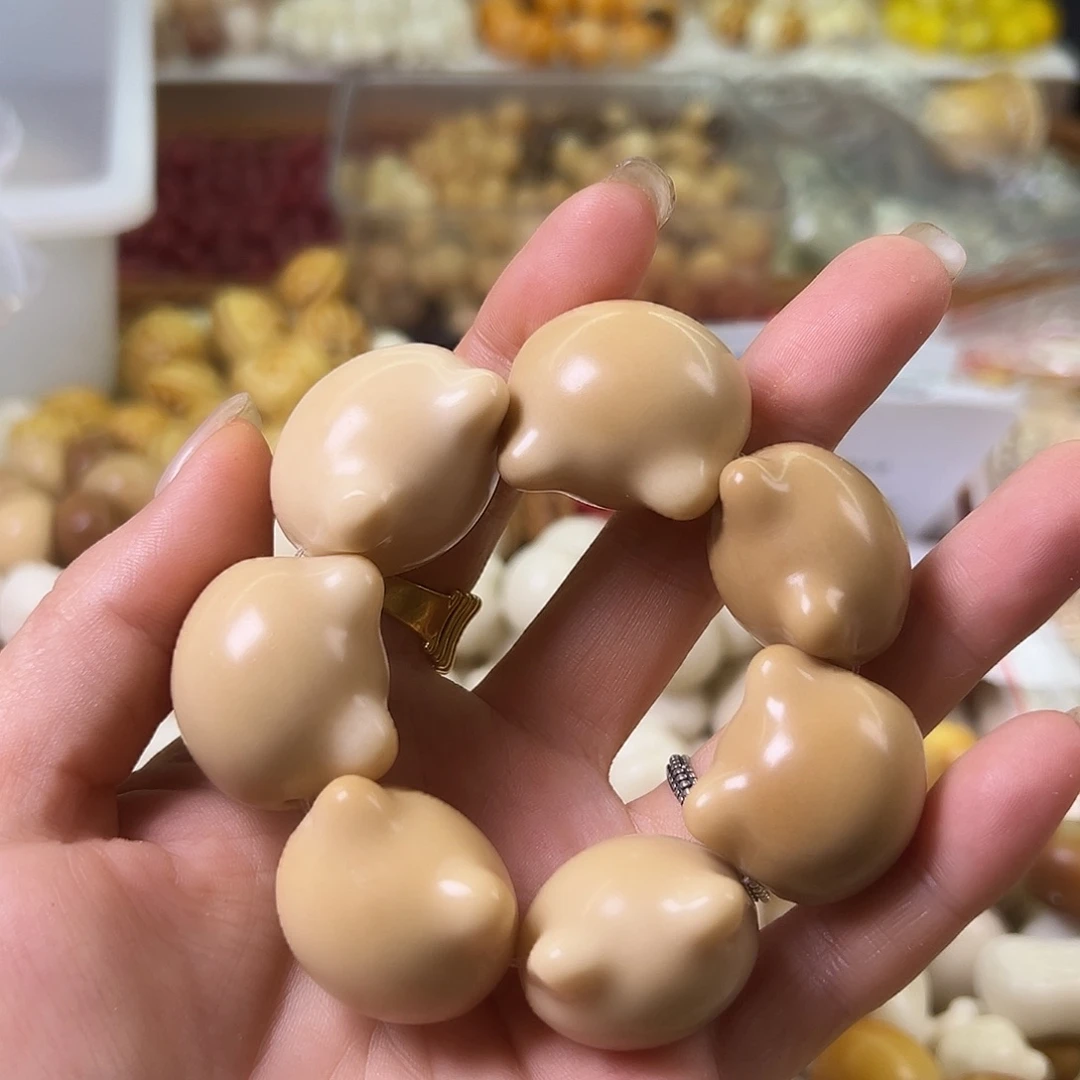 菩提根/象牙果手串微瑕茶色猫头手捻1条孔道有裂