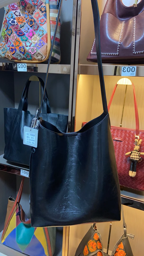 新款时尚简约小众水桶女包7219