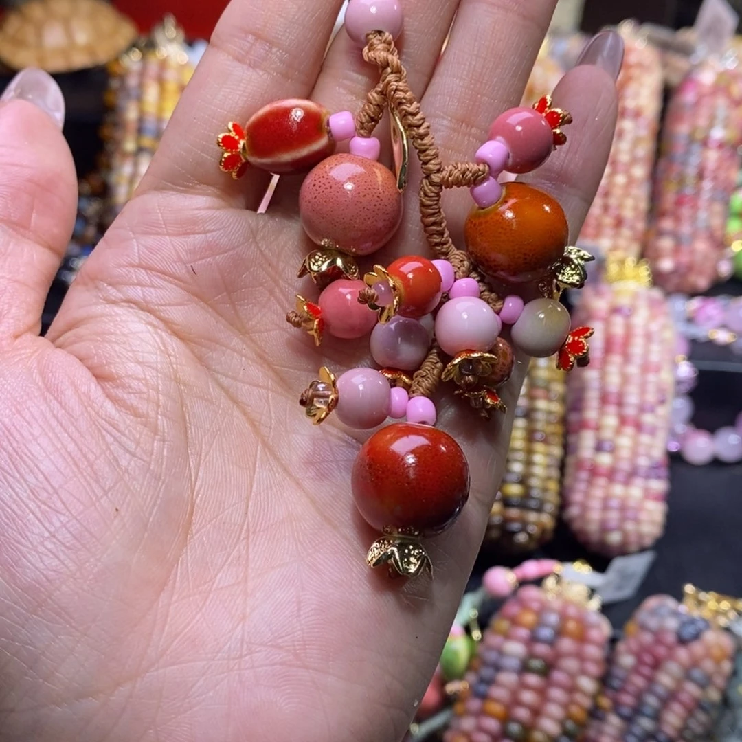 玉一****?文玩玉米 石榴链