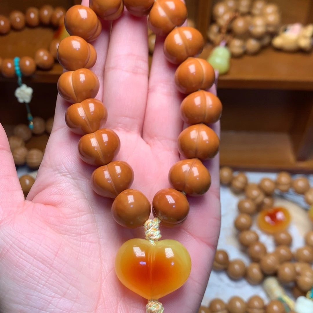 把件猴头核桃15玻璃底屁桃手持爱心