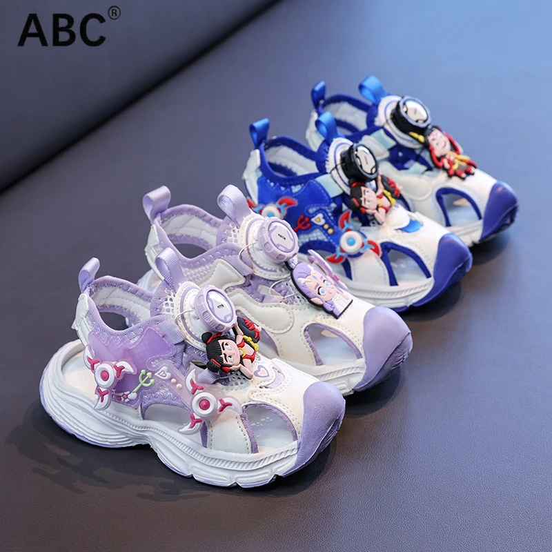 ABC夏季哪吒亮灯男女童鞋儿童镂空单网透气鞋旋转扣发光包头凉鞋