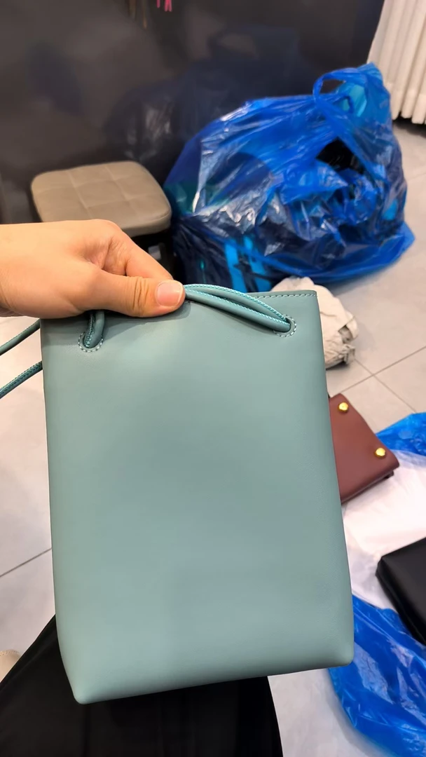 YUSHA/高档蓝色小罗抽绳手机包-8212