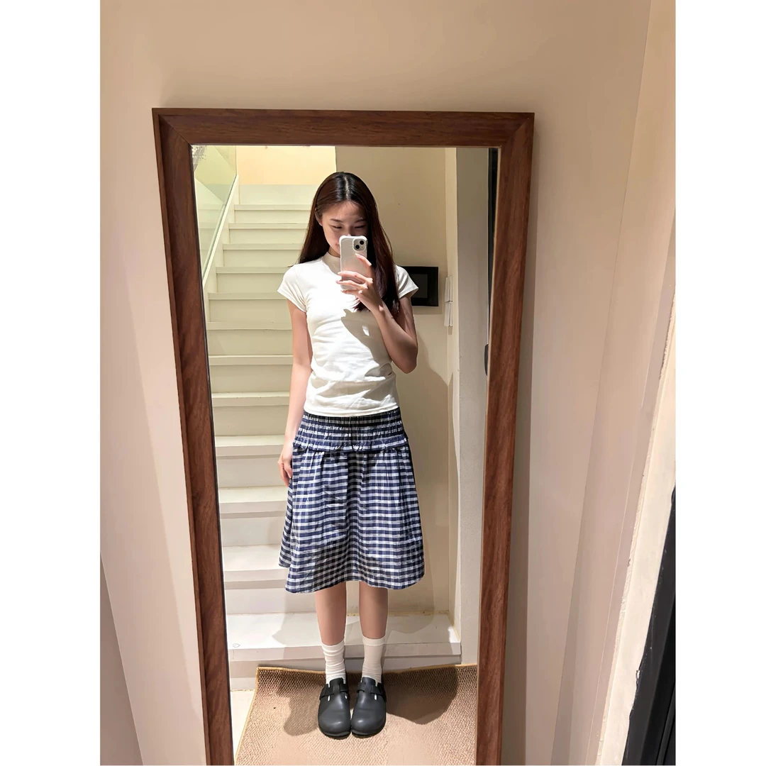 蓝色格纹A字半身裙女2025新款夏季休闲松弛感百搭连衣裙两穿伞裙