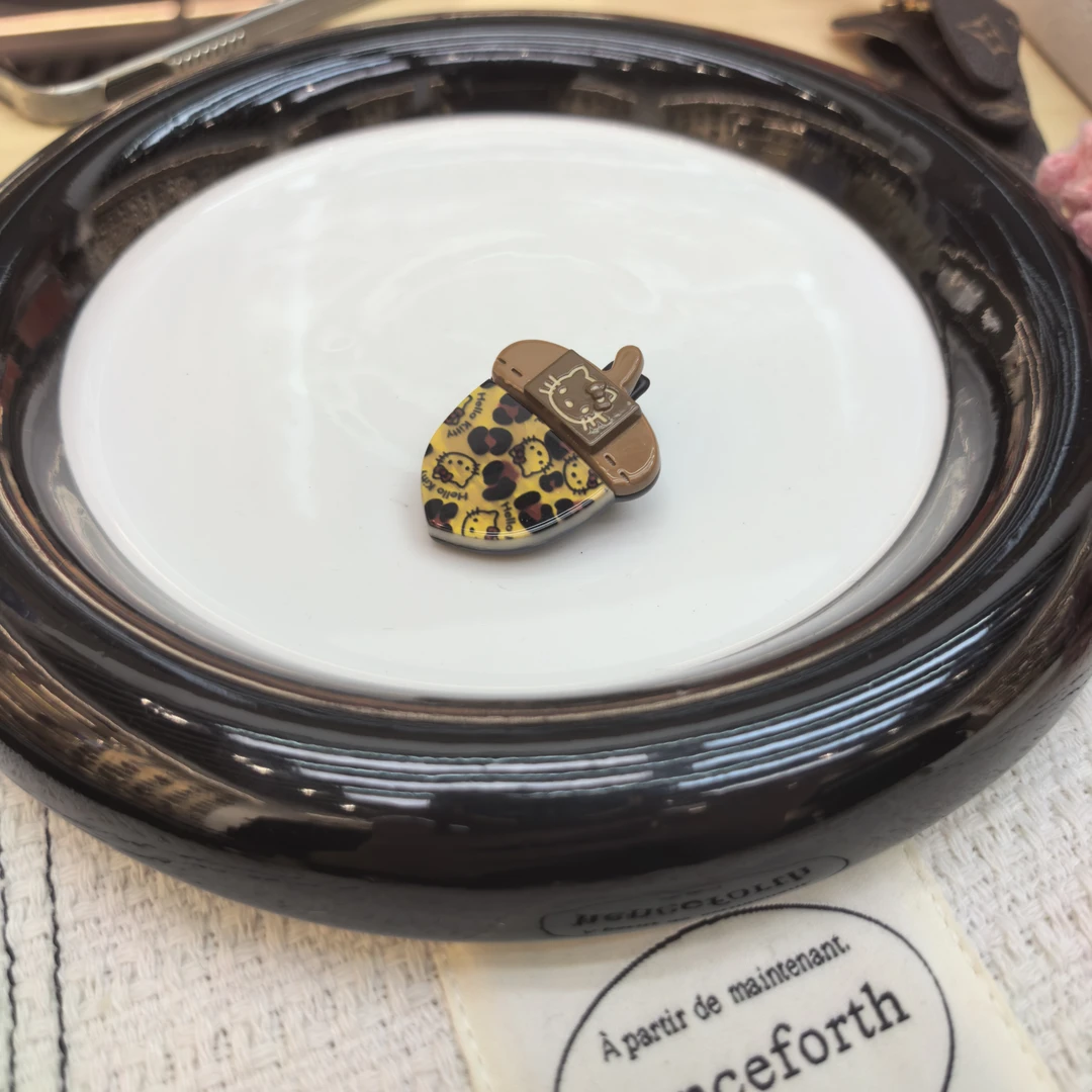 A600黄色豹纹小松果KT猫咪边夹