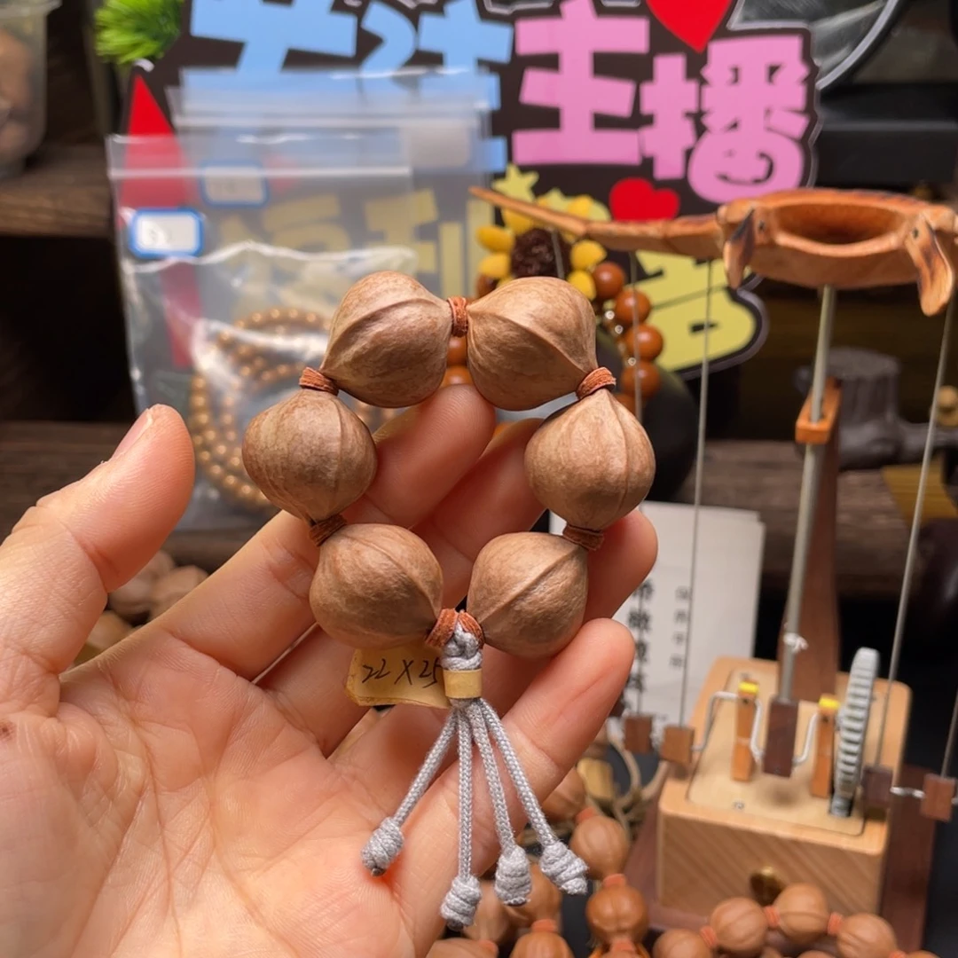 杨***）吊坠橄榄核2225手捻