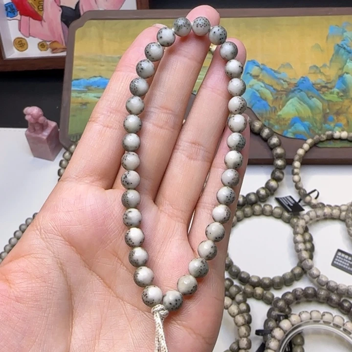 故***人手串星月菩提石玉绿背河豚7手持