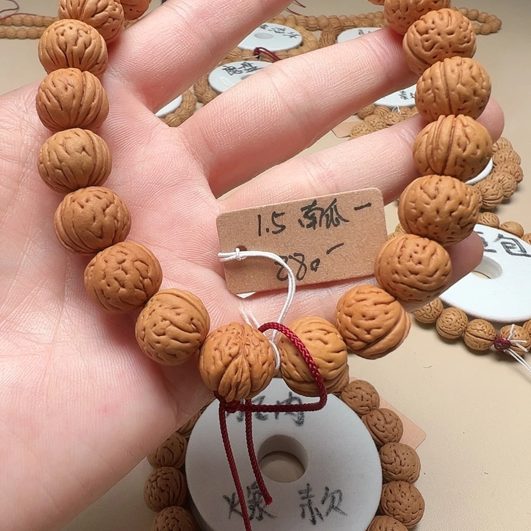 怀***桃核手串1.5红皮南瓜精品