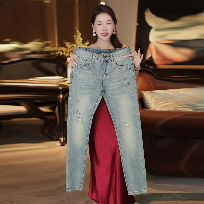 夏季薄款新款轻奢清爽蓝烫钻破洞男士修身牛仔裤时尚潮流百搭潮牌