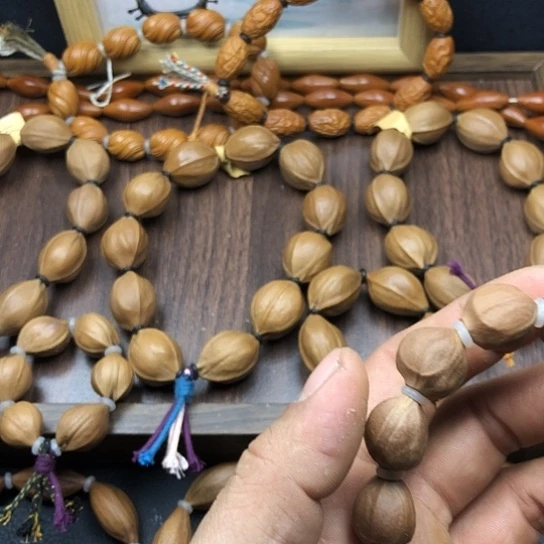 橄榄核吊坠蜜桃臀