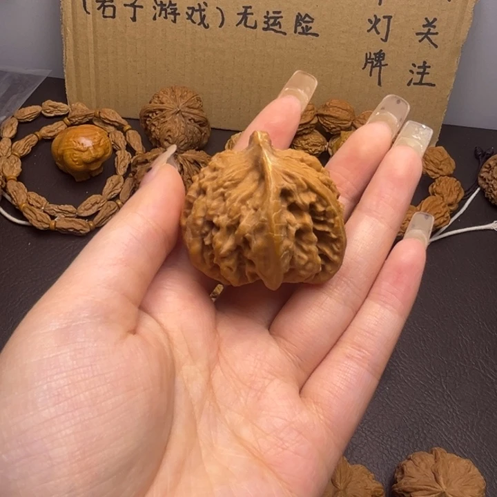 嗯***吖吊坠桃核单只异型有瑕