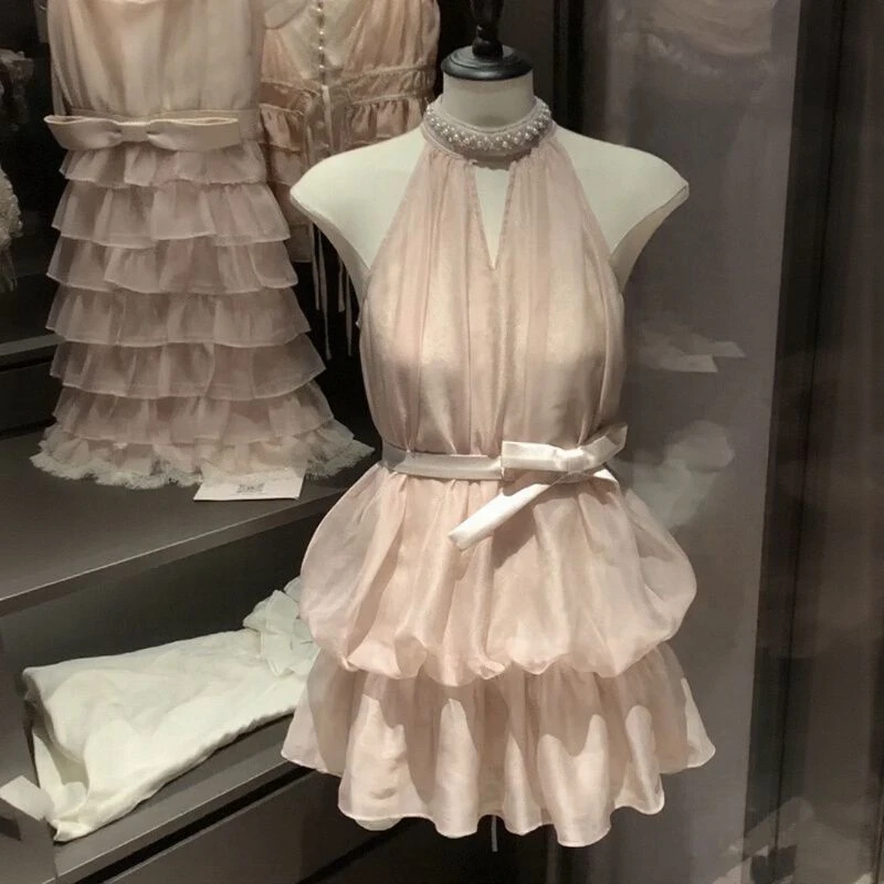 法式无袖挂脖千金风连衣裙女夏季减龄别致蝴蝶结绑带收腰花苞短裙