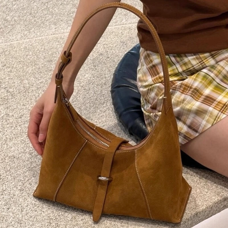 2025秋季新款轻奢小众手提复古饺子包包女式通勤单肩腋下hobo包