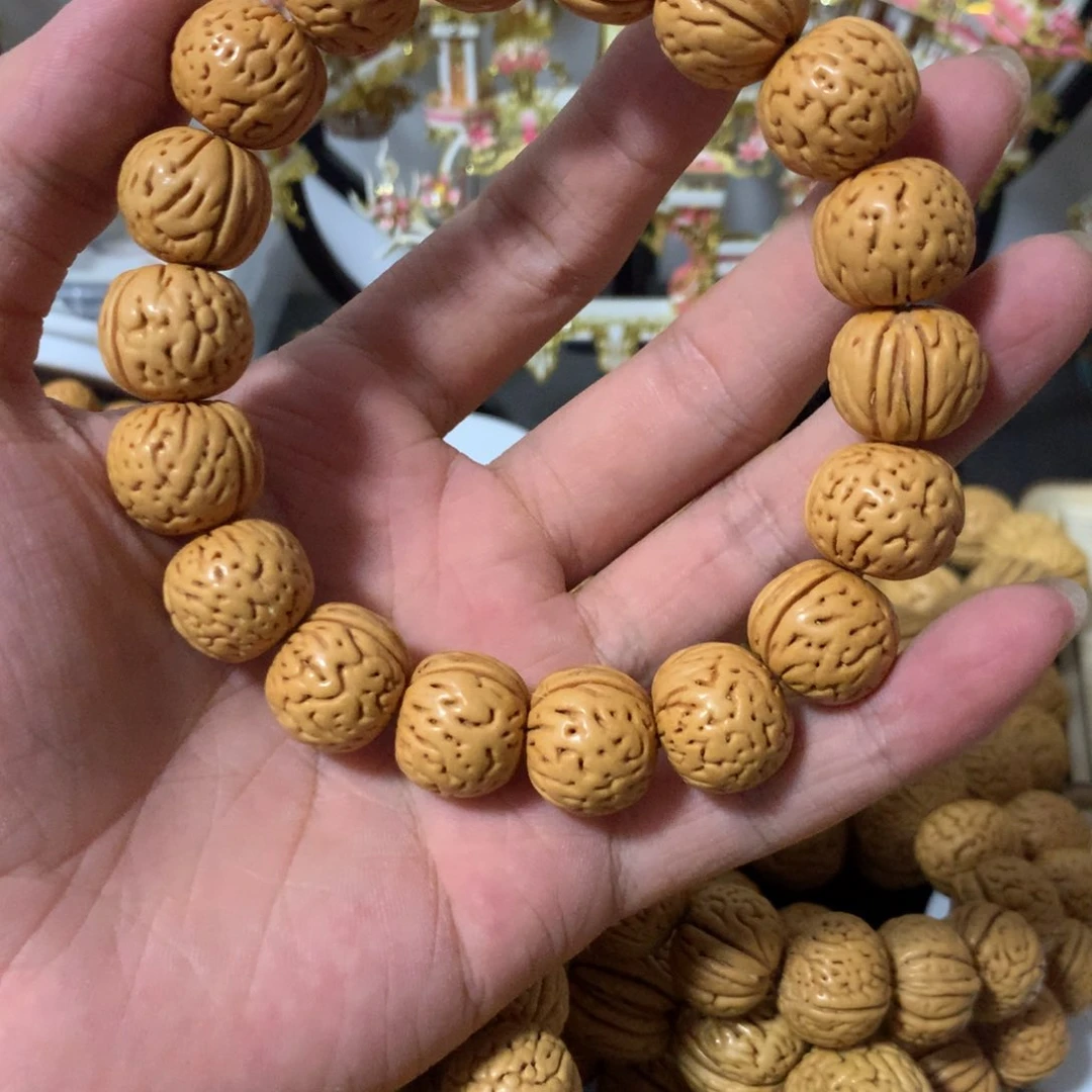 把***完精品桃核无双手串