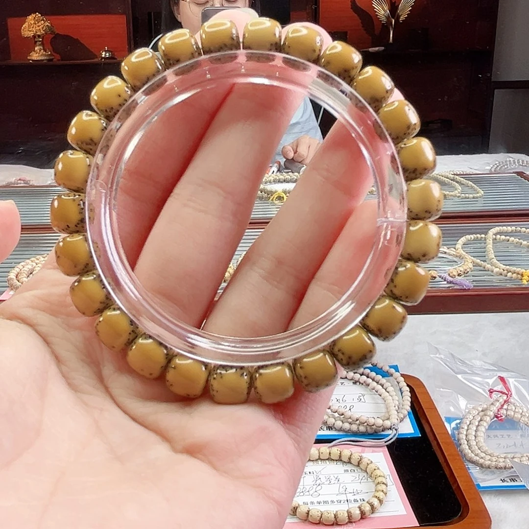手串星月菩提Fqh9*8鸡油黄 大光头留白 颗粒星 金标