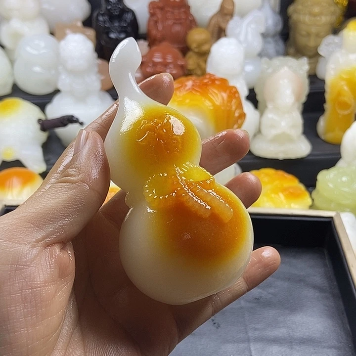无花朵黑**芒原石手把件