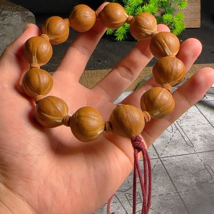 飘***生橄榄核2.0精品手串铁核