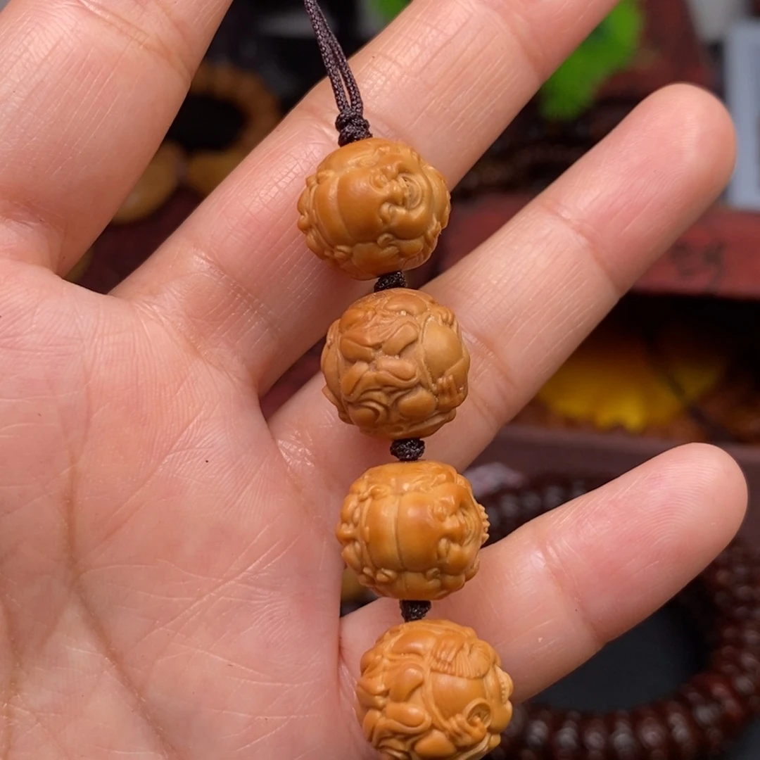 一***开橄榄核吊坠橄榄核雕刻