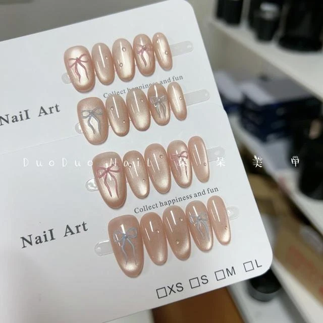 手绘同心结蓝粉AB款冰透立体蝴蝶结简约追光猫眼高级感手工穿戴甲