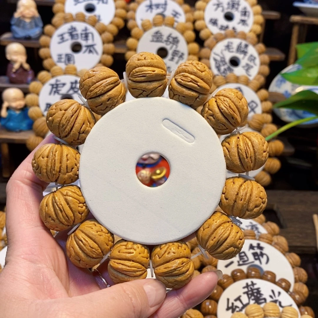 【闪购商品】宋**人桃核国核滚象手串