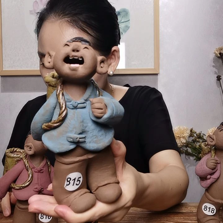 嘉***婷紫砂不规则羲娲娃系列作品背篓男娃